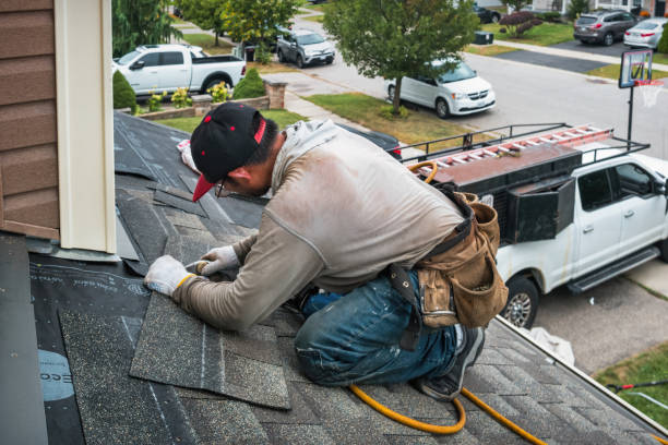 Professional Flat Roof Repair technician working in Henderson, IL